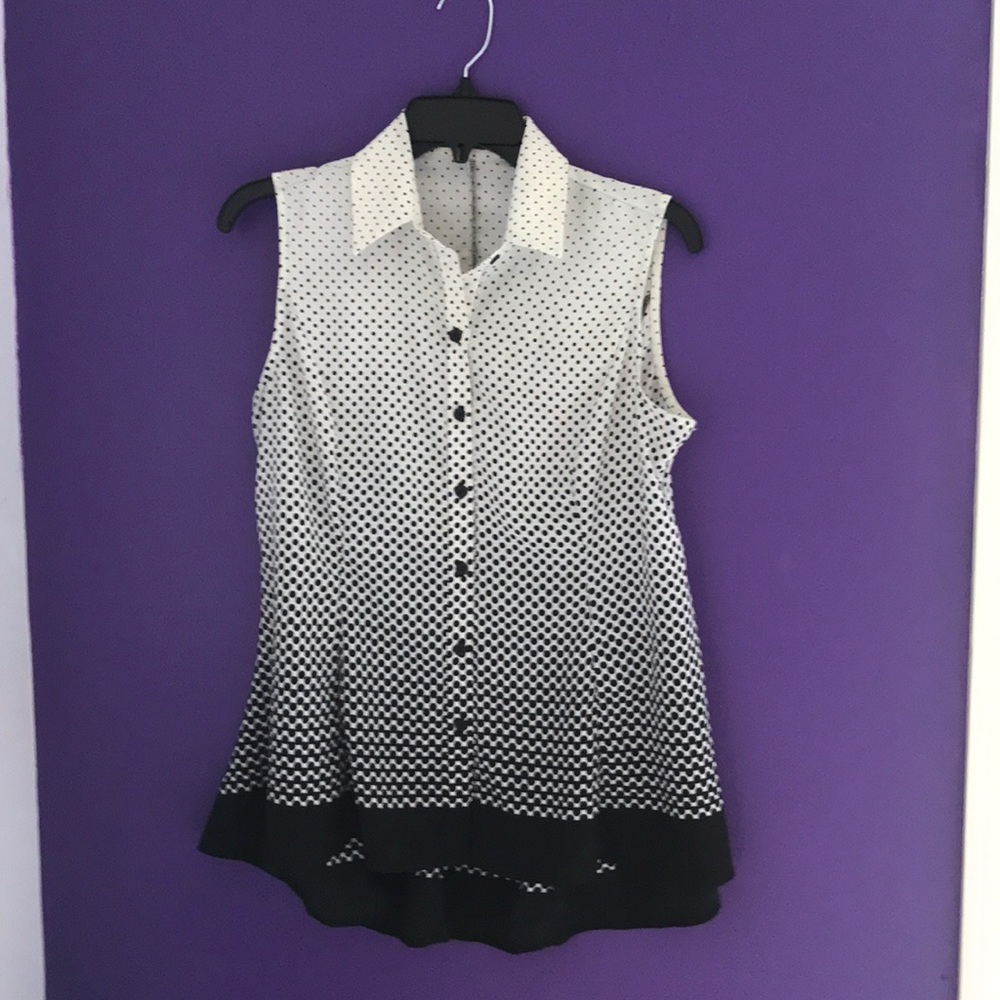 Sleeveless blouse size medium longer in back